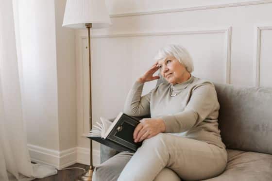 A woman sat reading a book